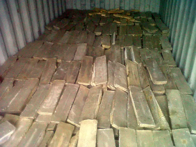 Brass ingots loaded in a shipping container - Metallic Metal Trading FZCO